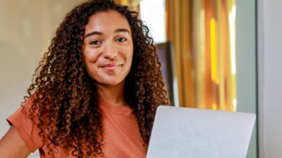 A woman working on a laptop