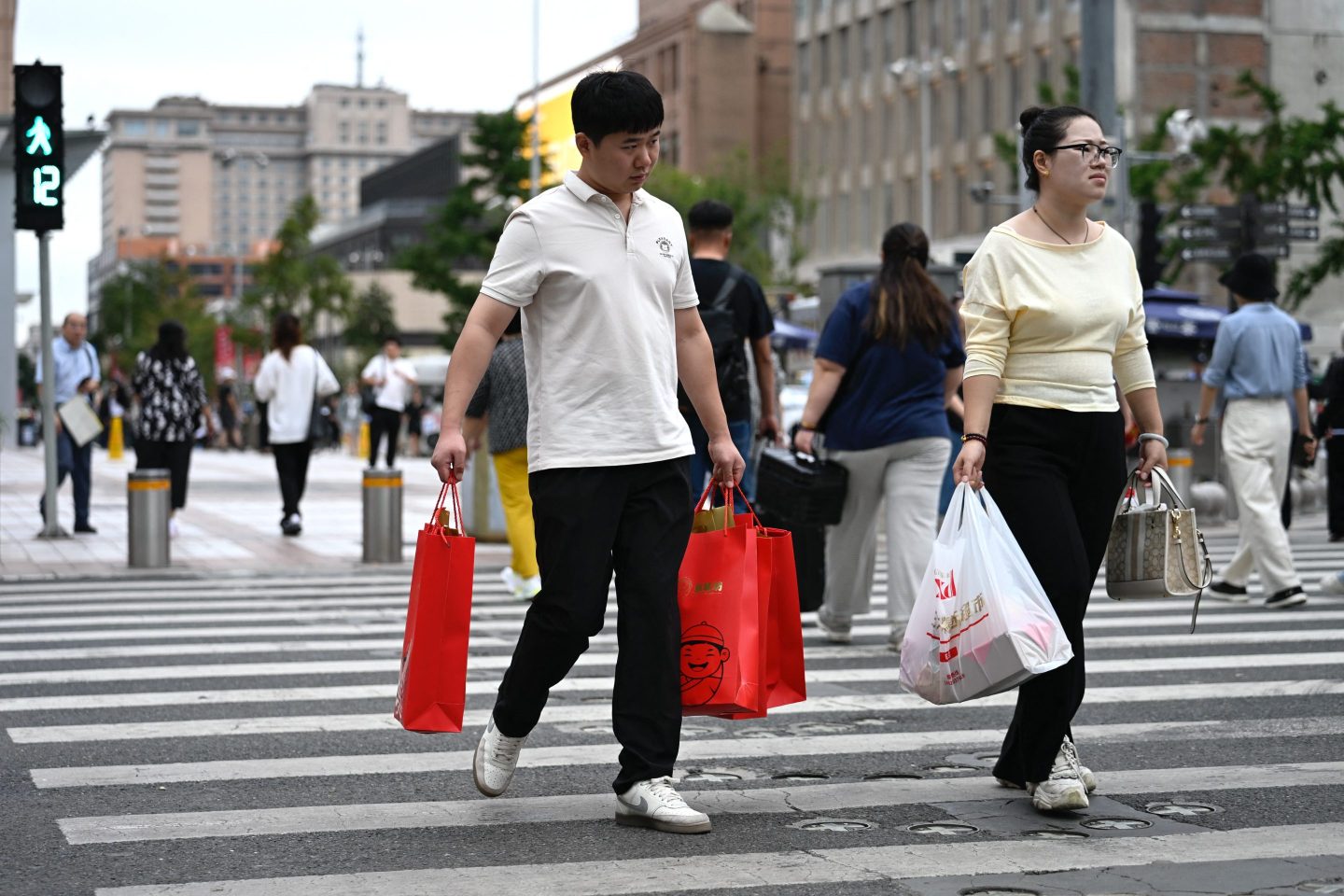 China’s economy continues to stumble as industry output, retail sales disappoint