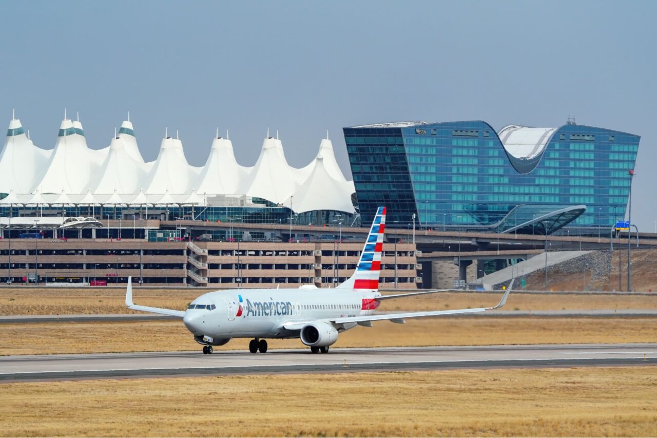 An American Airlines plane sits on the tarmac at Denver International Airport