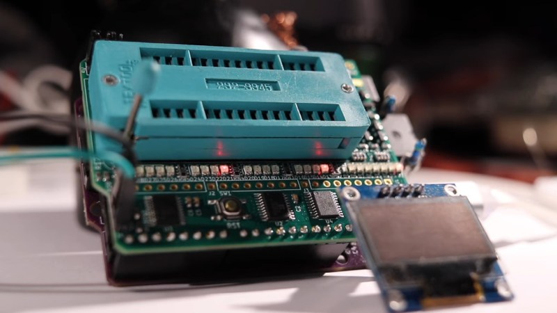 The ROM programmer on display, with an OLED screen attached