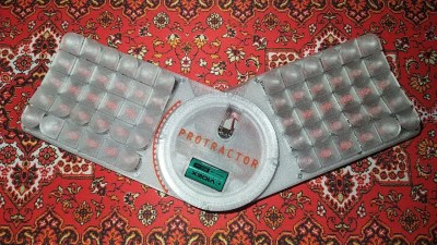The Protractor, an adjustable monoblock split keyboard with sliding angles.