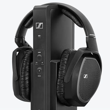 wireless headphones displayed with a charging dock wireless headphones displayed with a charging dock
