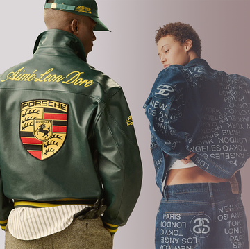 two individuals wearing stylish jackets one with a porsche logo two individuals wearing stylish jackets one with a porsche logo