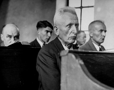 Villagers attending church, by Walter Sanders