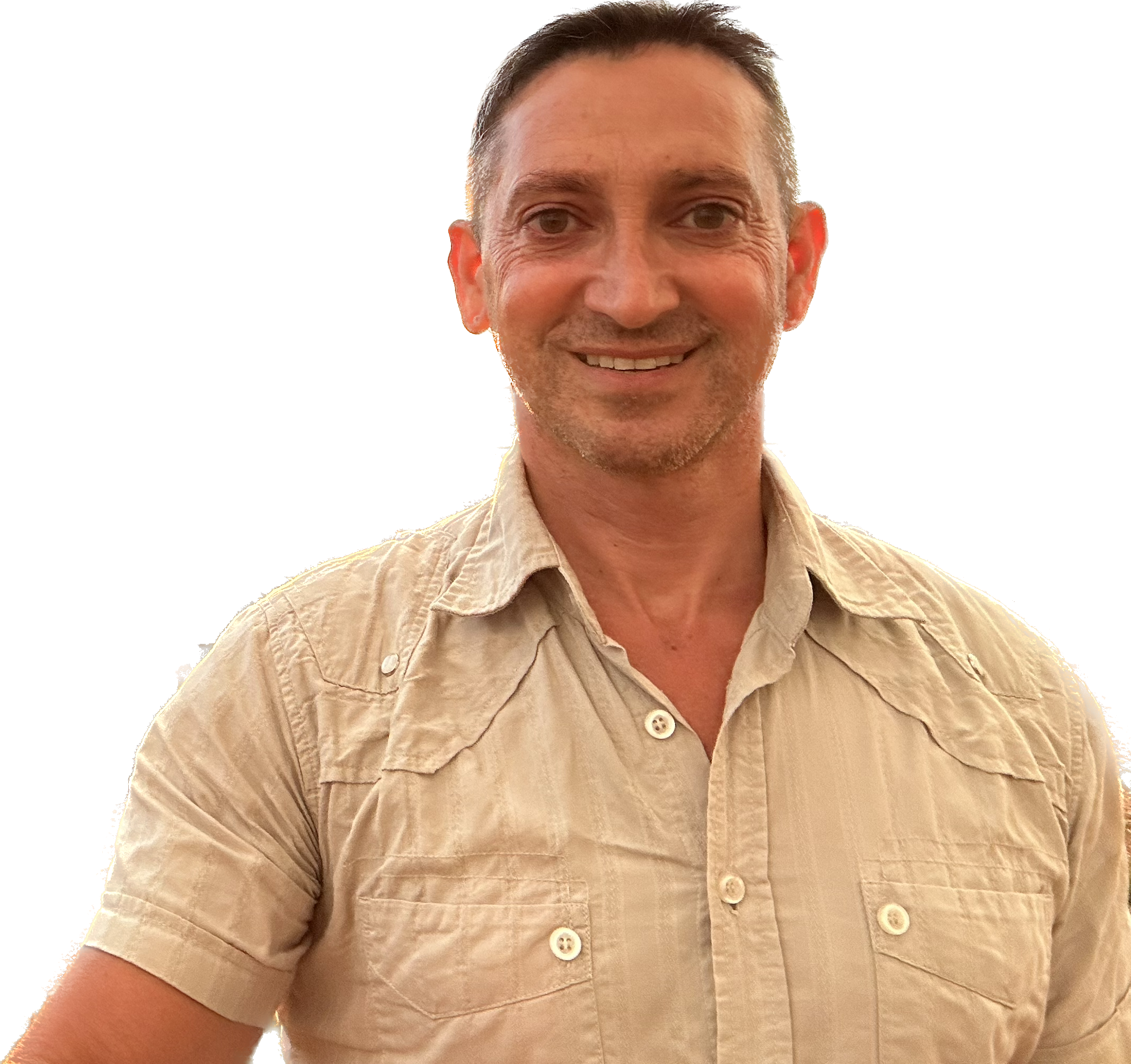 Richard Kurylo with short hair and a short-sleeved tan top