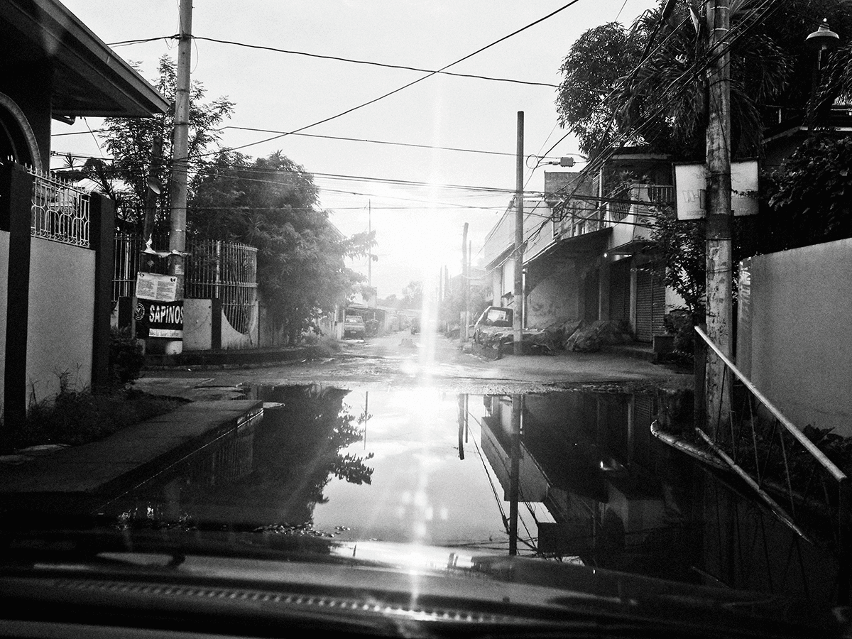Photograph of a road in Manila leading to Taskus