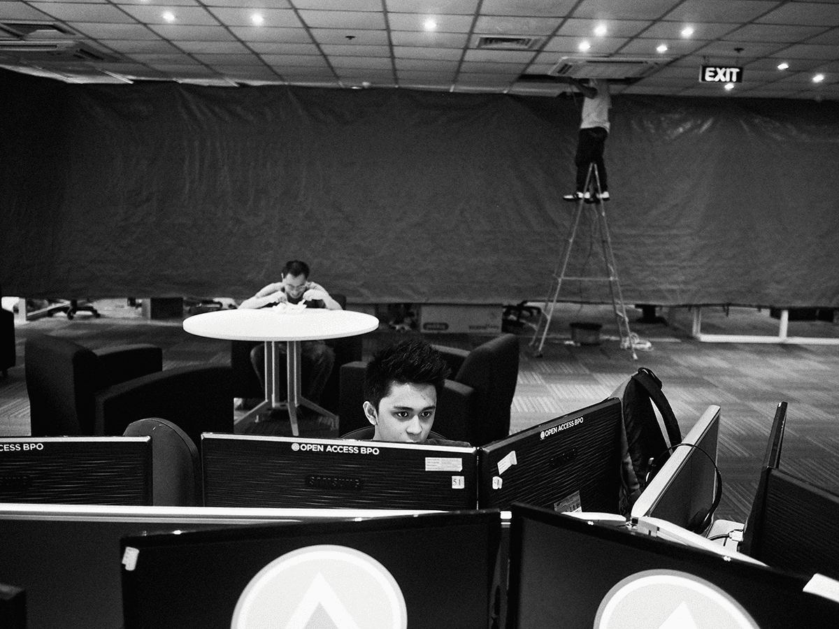 Photograph of people working in an office