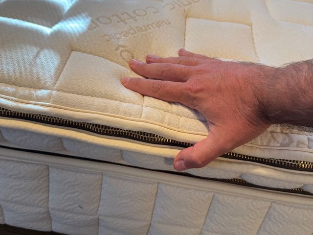 Image may contain hand on mattress