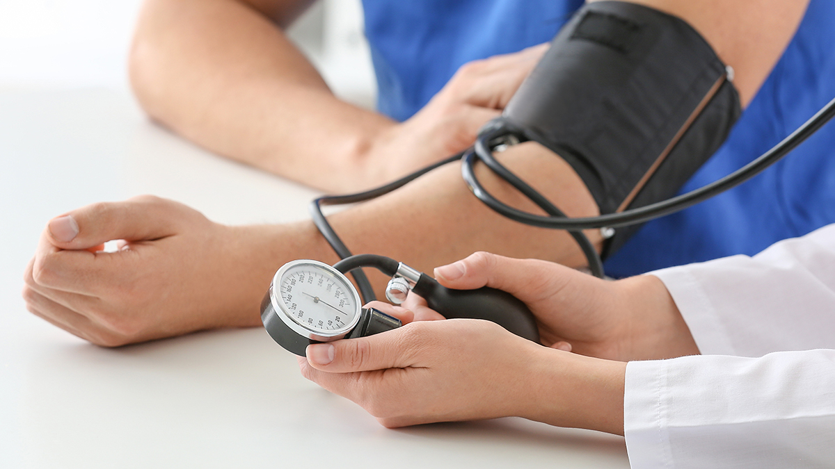 checking blood pressure